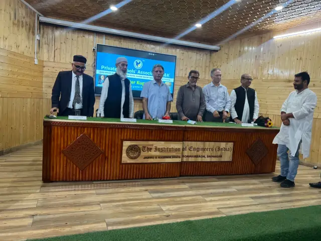 Panel seated at the head table